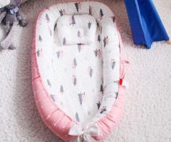 Ensure safety during naps with superb spine support for newborns with a snuggle nest bed - 1