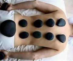 Experience the Ultimate Hot Stone Massage in New York at Energy Men Spa - 1