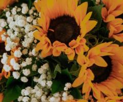 Bring the Sunshine with our Radiant Sunflower Bouquet