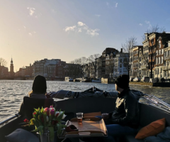 Discover the Magic of Amsterdam: Evening Cruise with Boat Local