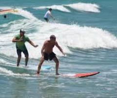 Glide with Style: Longboard Surfing in Barbados