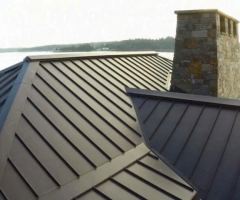 Metal Roofing Systems: Durable Solutions with Green Ladder Contractors