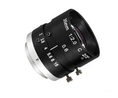 How do industrial lenses help in achieving accuracy?